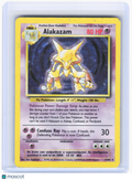 1999 Pokemon—Alakazam #1/102 Base Set—Holo Rare (DMG)