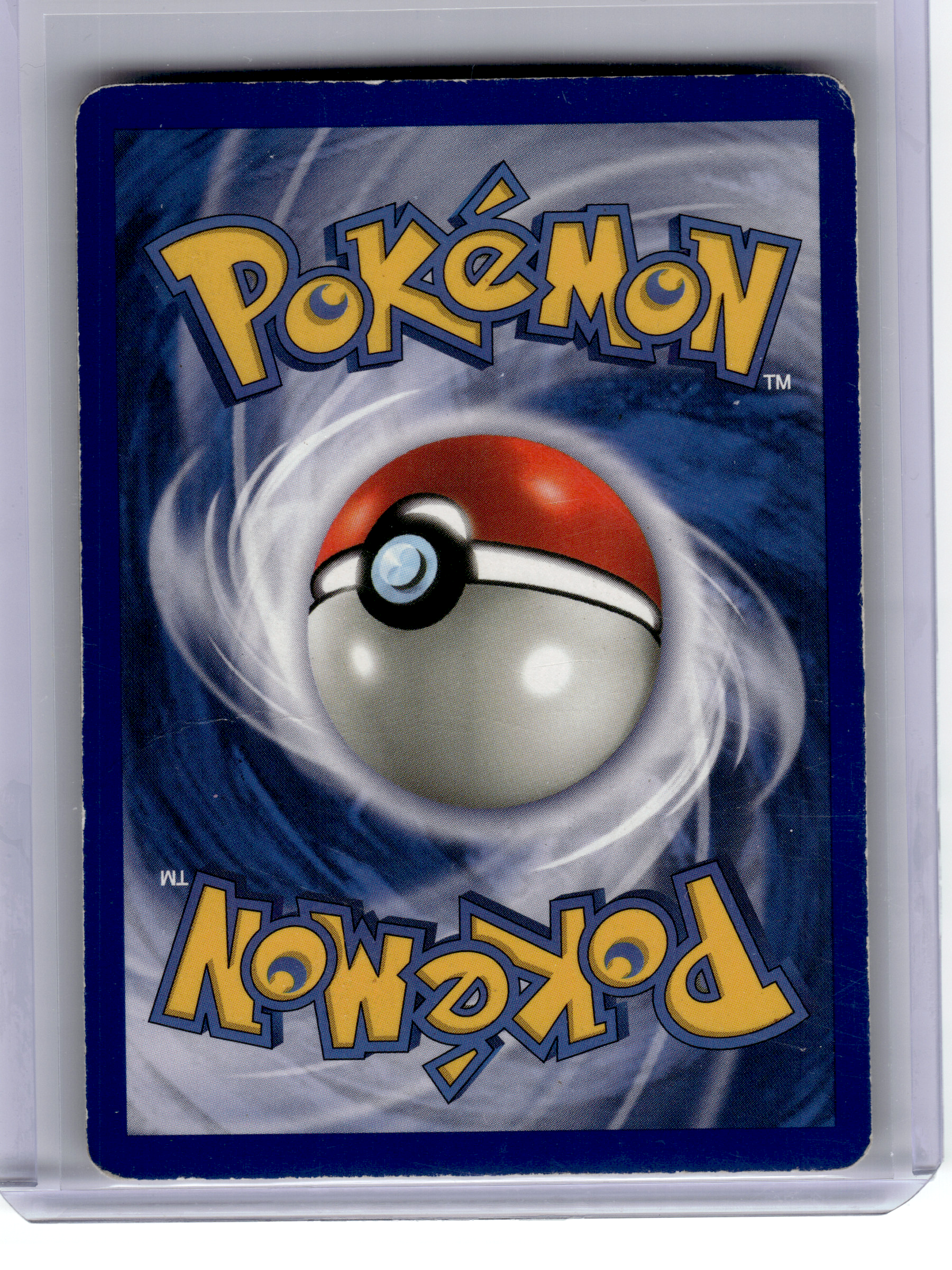 1999 Pokemon—Dragonite #4 Fossil—Rare Holo [Damage]